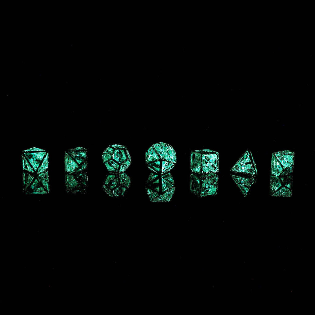Skull's Grin Hollow Metal Dice Set - Glow in the Dark Blue