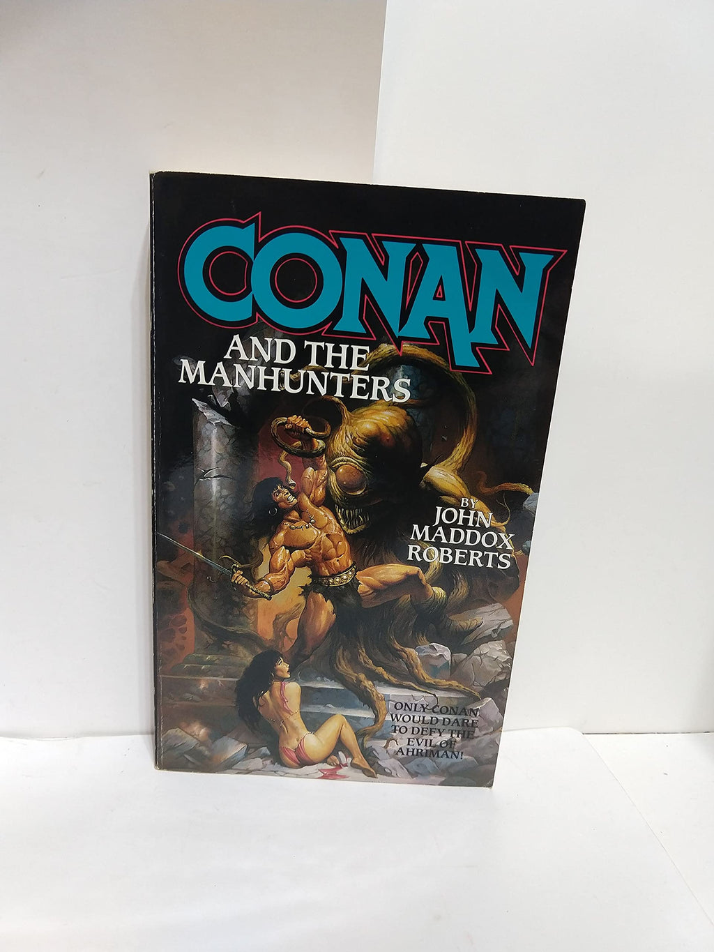 Conan and the Manhunters by Roberts, John Maddox
