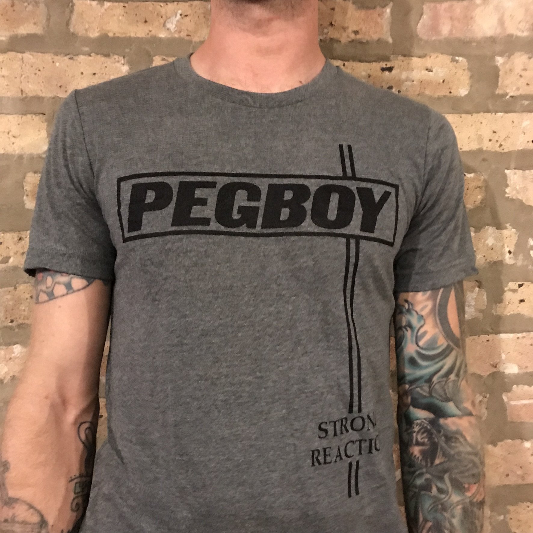Pegboy "Strong Reaction" 50/50 Tee Shirt