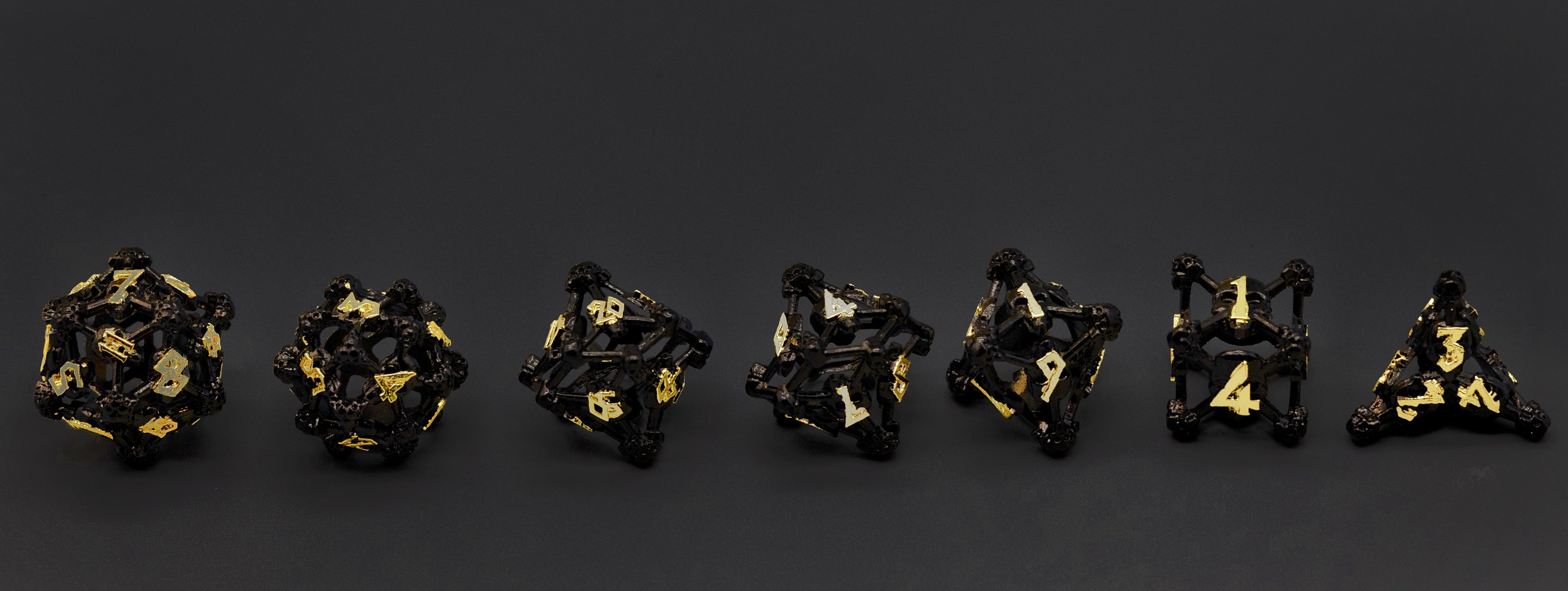 Black w/Gold Deadly Skull Dice Hollow Metal 7-Dice Set