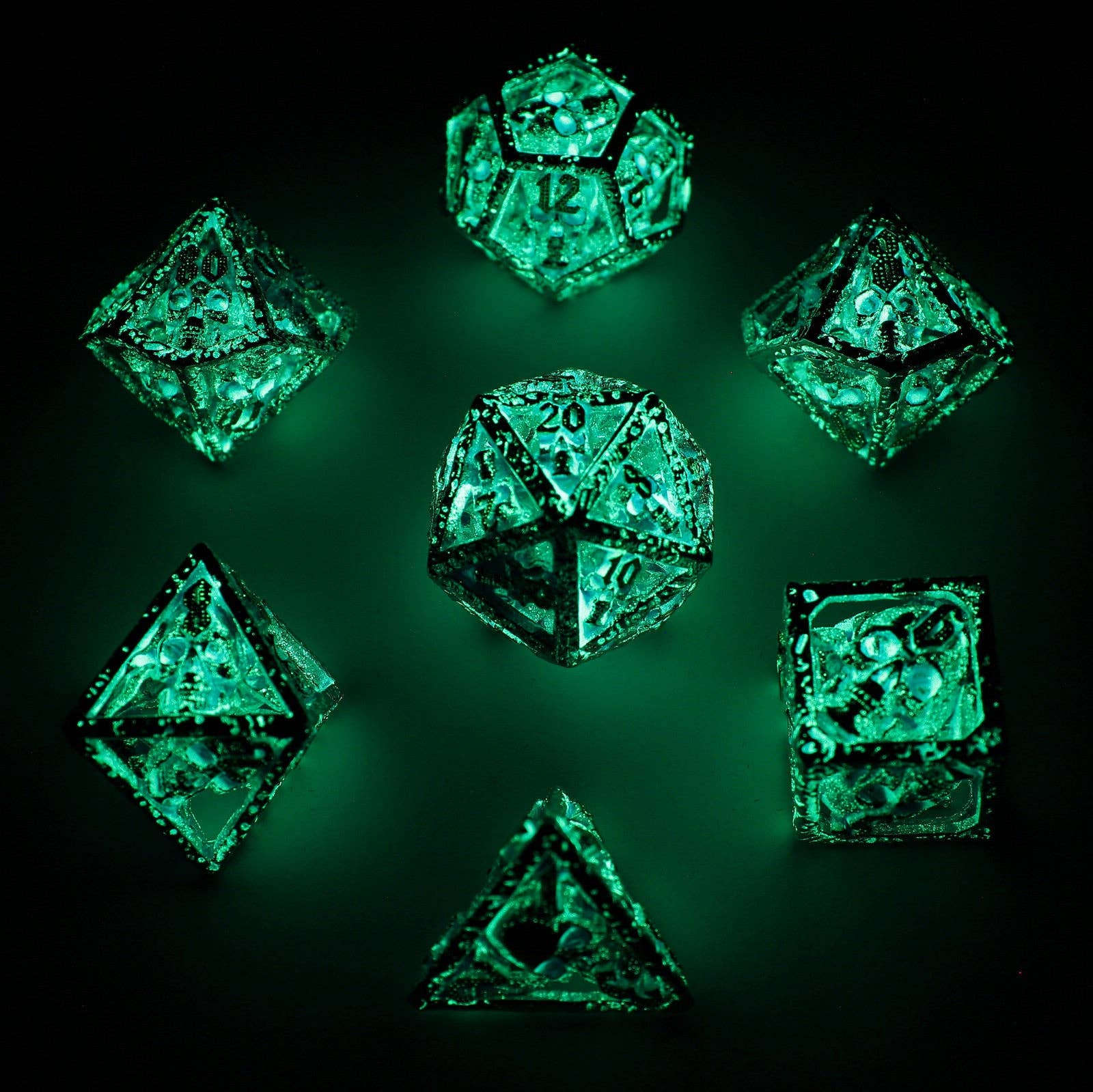 Skull's Grin Hollow Metal Dice Set - Glow in the Dark Blue