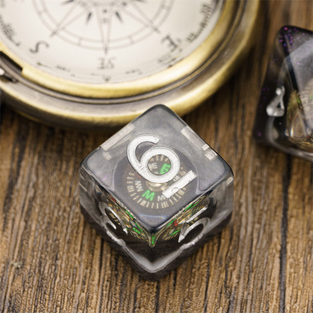 Compass Dice 7-Dice Set Clear w/ Moving Compass Inside Glitter Base Dnd