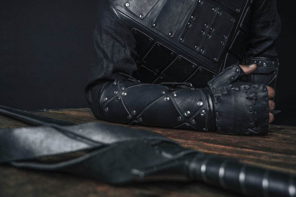 Medieval leather bracers with hand protection