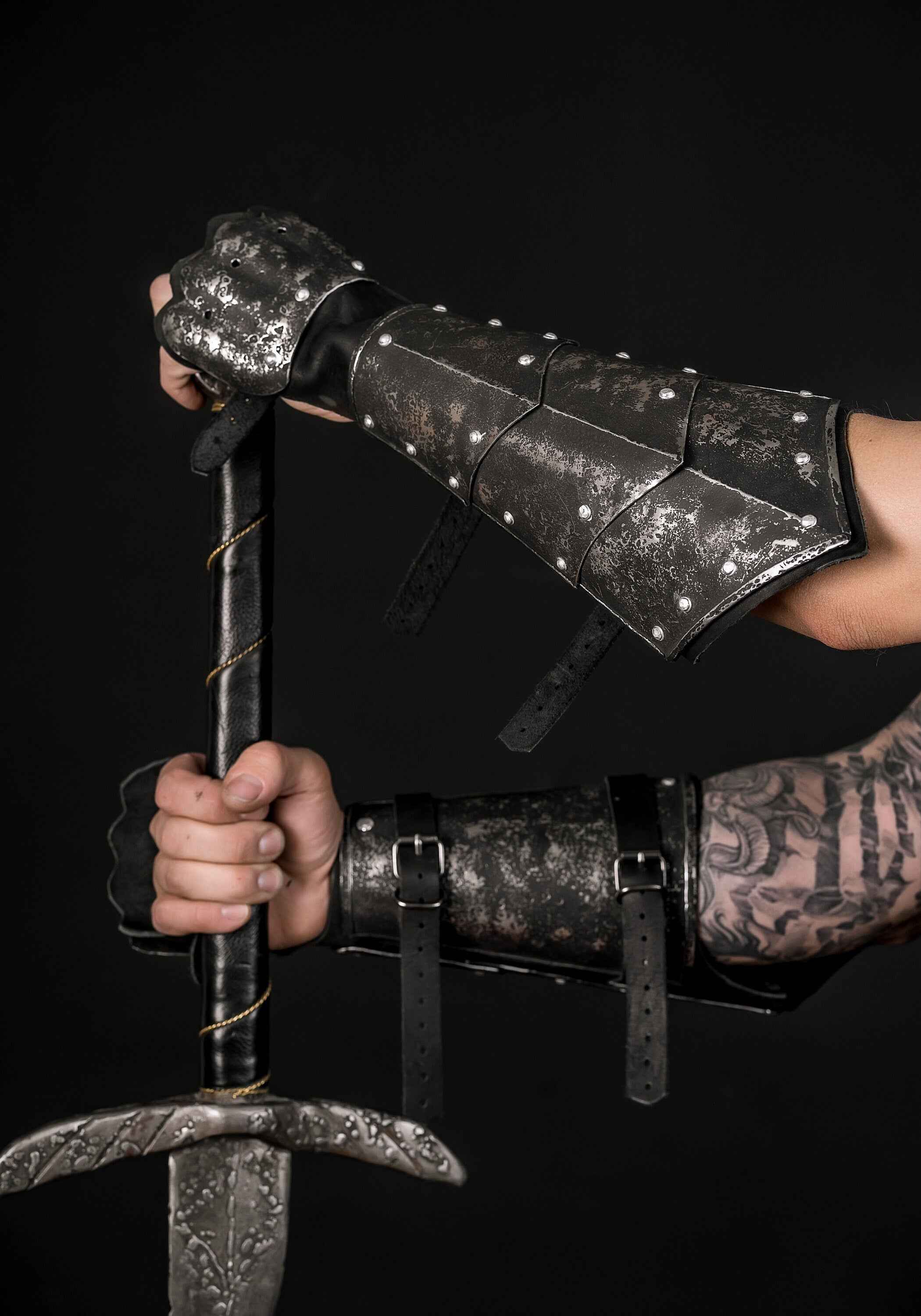 Medieval leather bracers with hand protection
