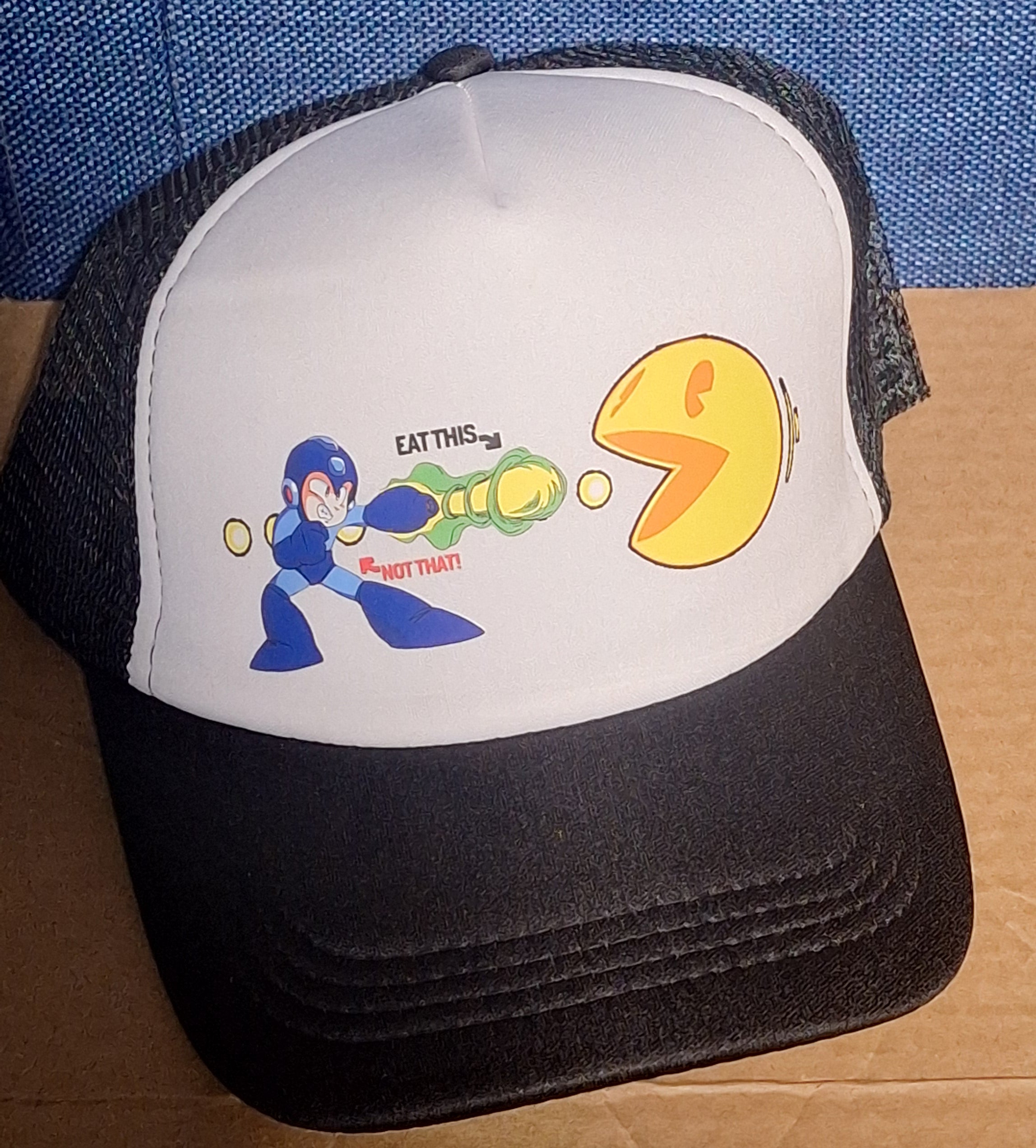 Adjustable Trucker Baseball Cap Featuring Megaman vs Pac-Man 'Eat This Not That' Graphic Design